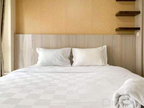 Modern Look and Comfy Studio Tifolia Apartment By Travelio